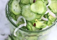 Cucumber salad with onions and red pepper flakes in a jar