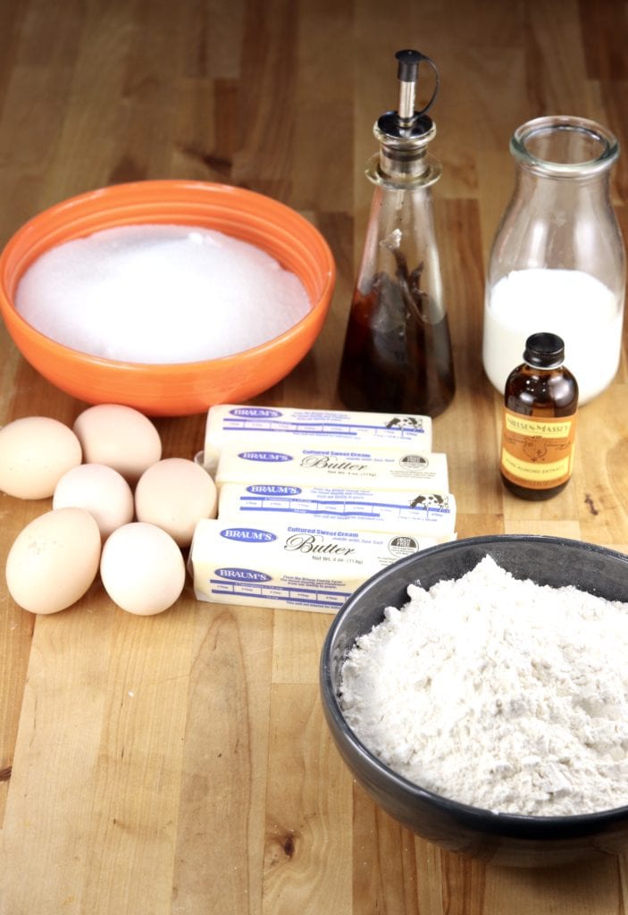 Ingredients for pound cake: butter, sugar, flour, eggs, milk, vanilla & almond extract