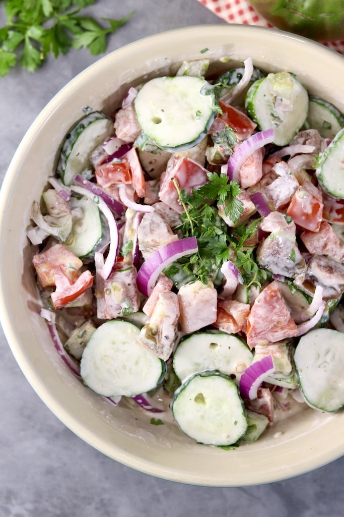 Creamy Cucumber Tomato Salad with red onion and herbs