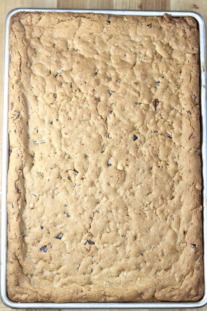 Baked sheet pan of date bars with nuts