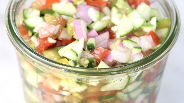 Jar of cucumber tomato salad
