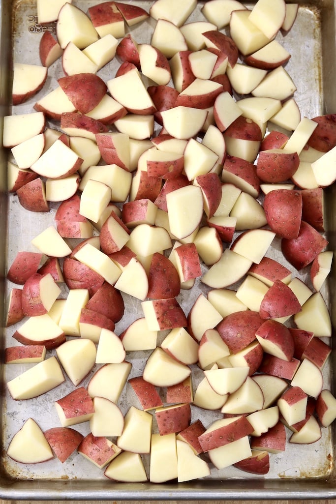 Cubed red potatoes on a sheet pan