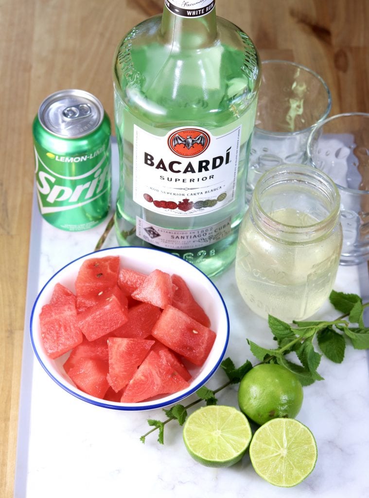 Rum, watermelon, Sprite, simple syrup, lime and mint for mojitos cocktails