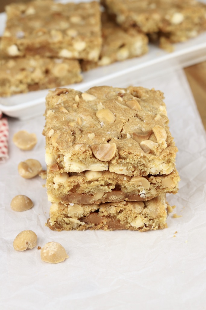 Caramel White Chocolate Macadamia Nut Bars - stack of 3 on a white plate