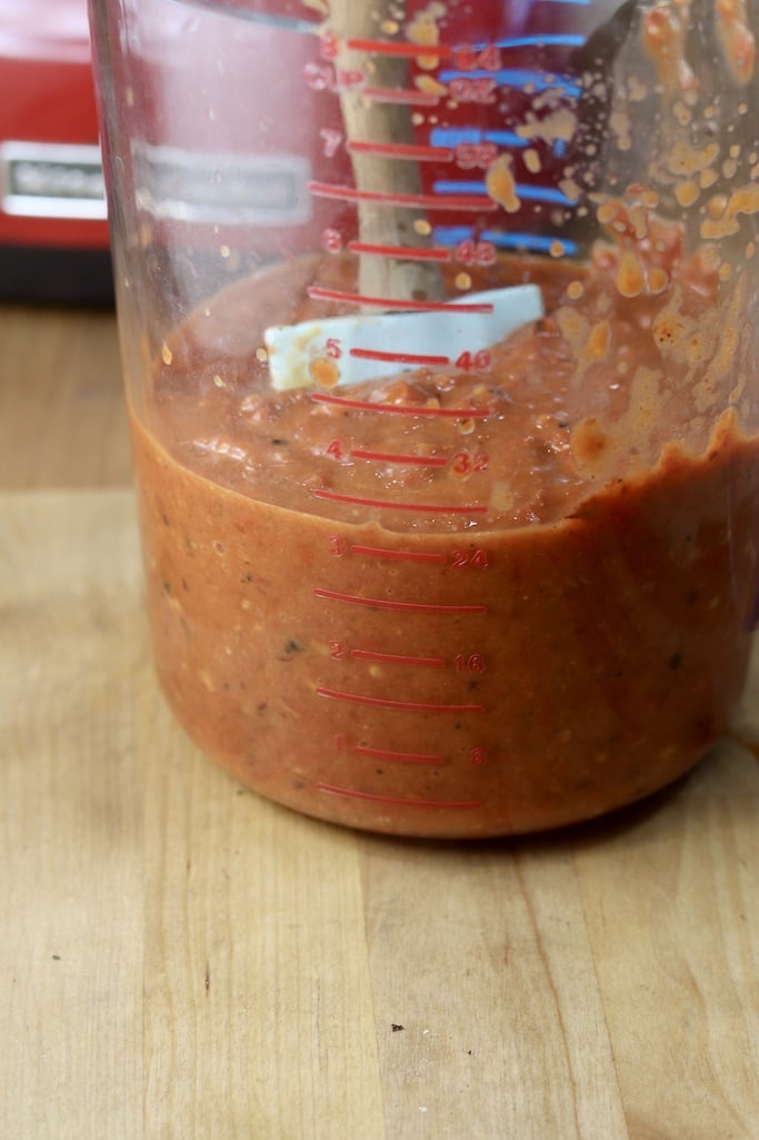 Measuring cup with 3 cups of homemade tomato sauce