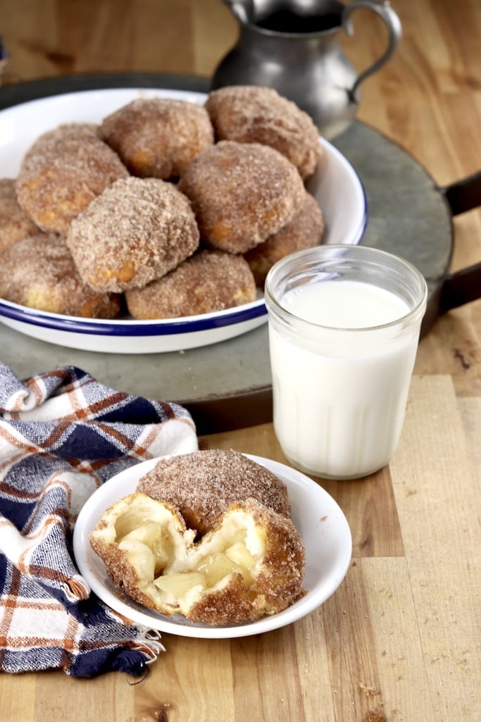 Churro Apple Pie Bombs with milk, one serving and pie plate filled