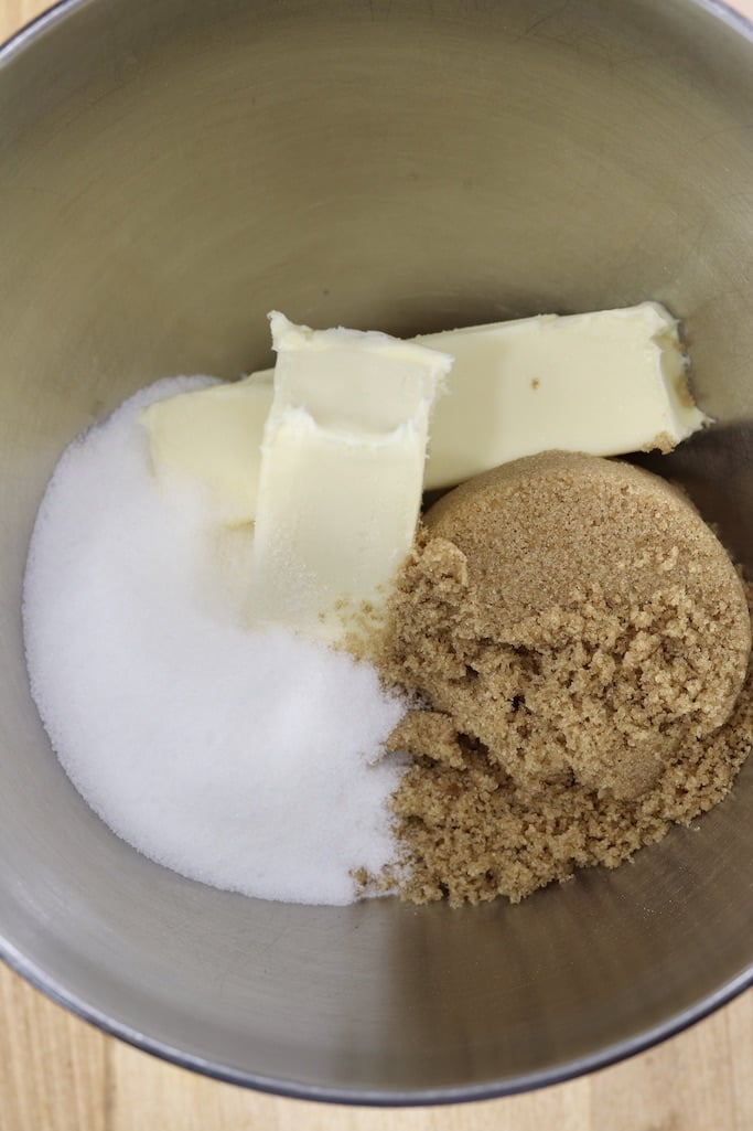 Sugar, butter sticks and brown sugar in a mixing bowl
