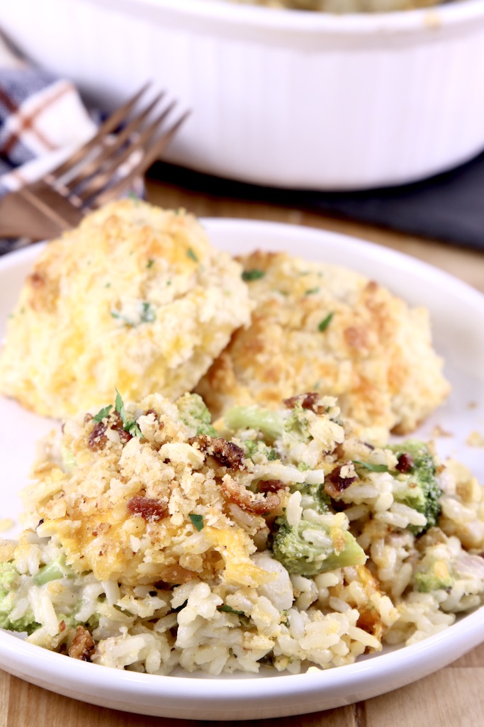 Plated chicken broccoli rice casserole with biscuits