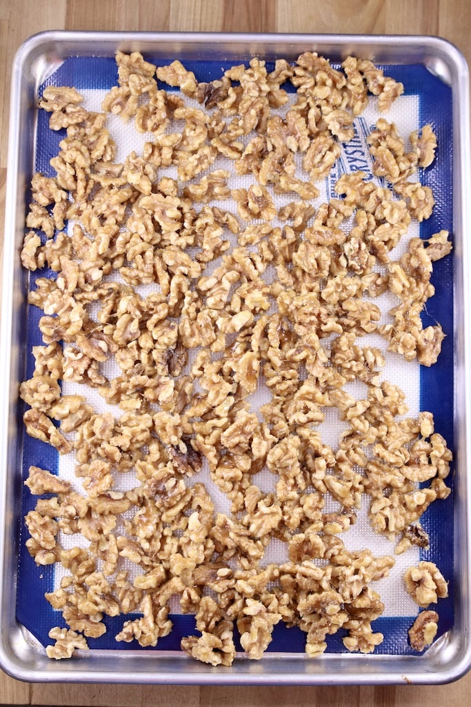 Candied walnuts on a silpat lined baking sheet