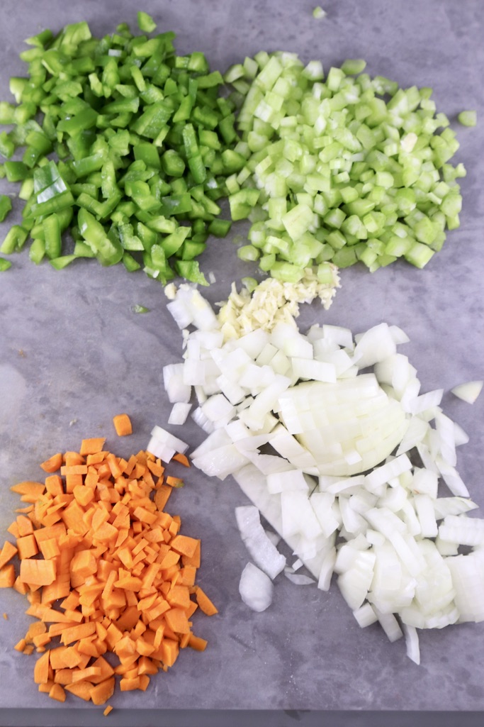 chopped carrots, bell peppers, celery, onions and garlic