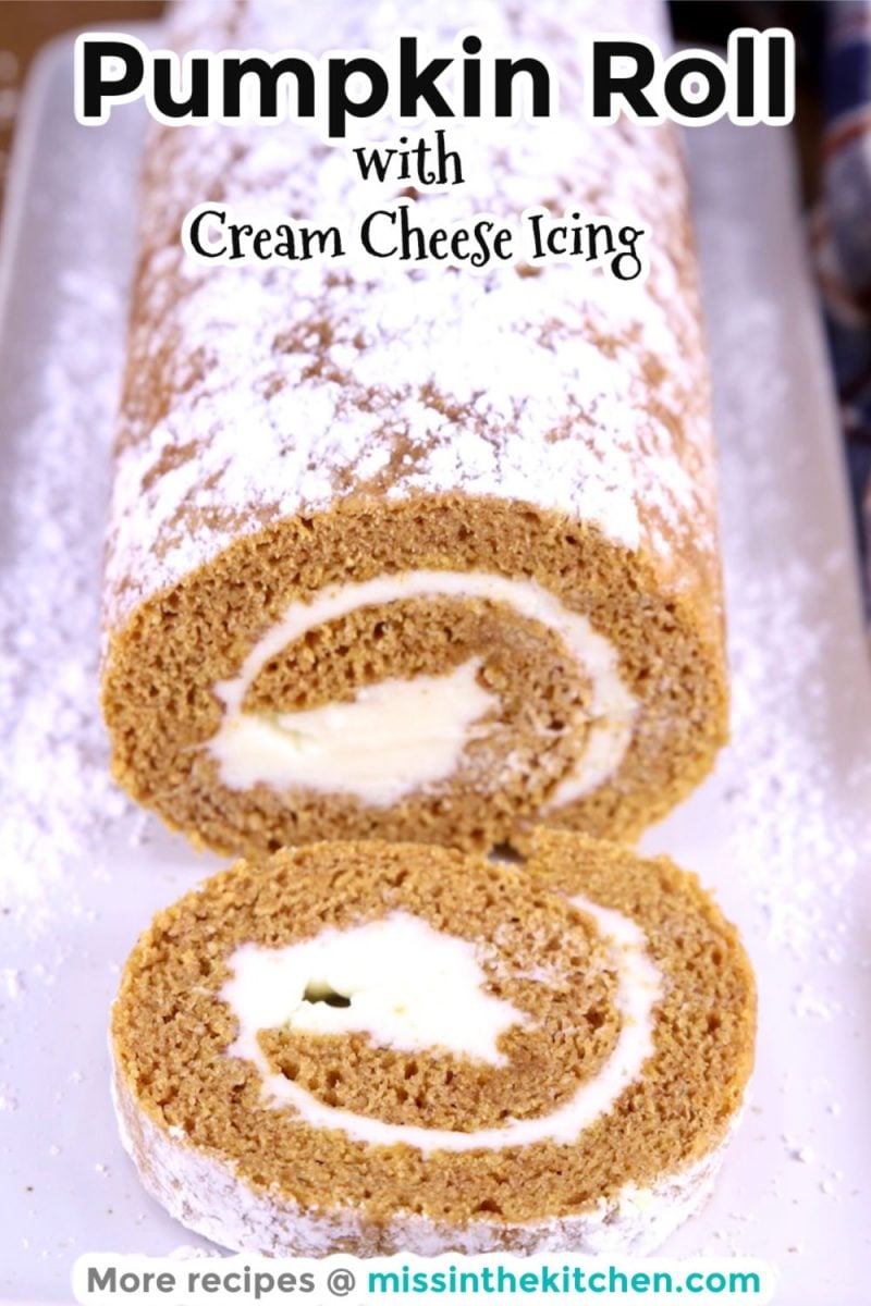 Pumpkin Roll with Cream Cheese Icing on a platter with one slice