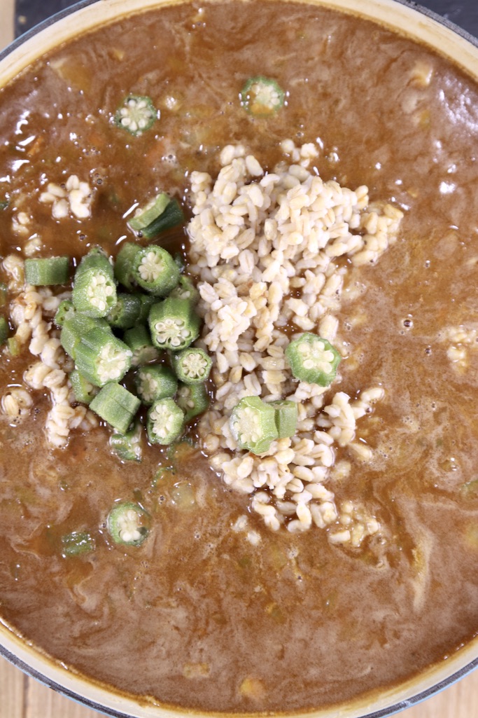 soup with okra and barley added to the pan