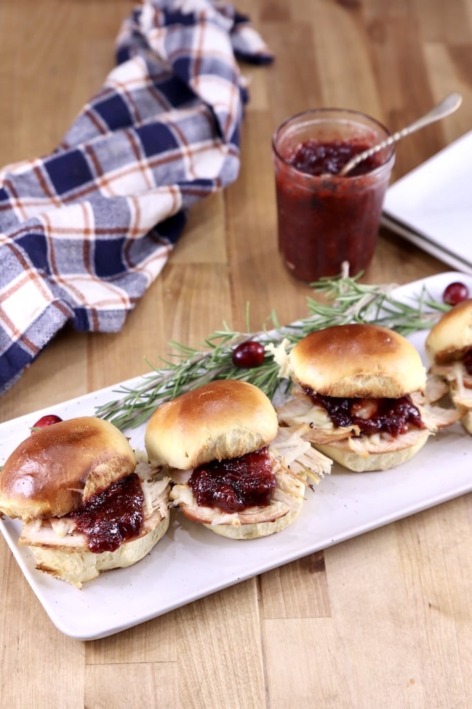 Platter of turkey sliders with cranberry bbq sauce