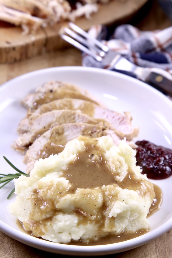 Mashed Potatoes with gravy and sliced potatoes