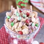 White Trash Snack Mix in a bowl with Christmas M&M's