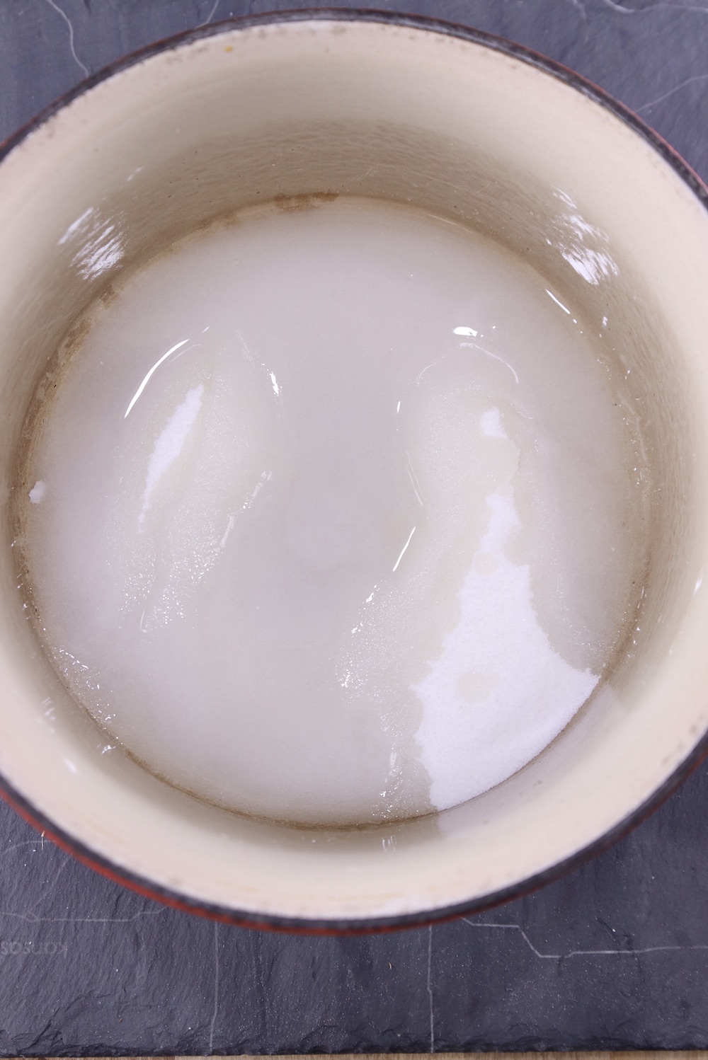Pan with sugar and water for making boiled icing