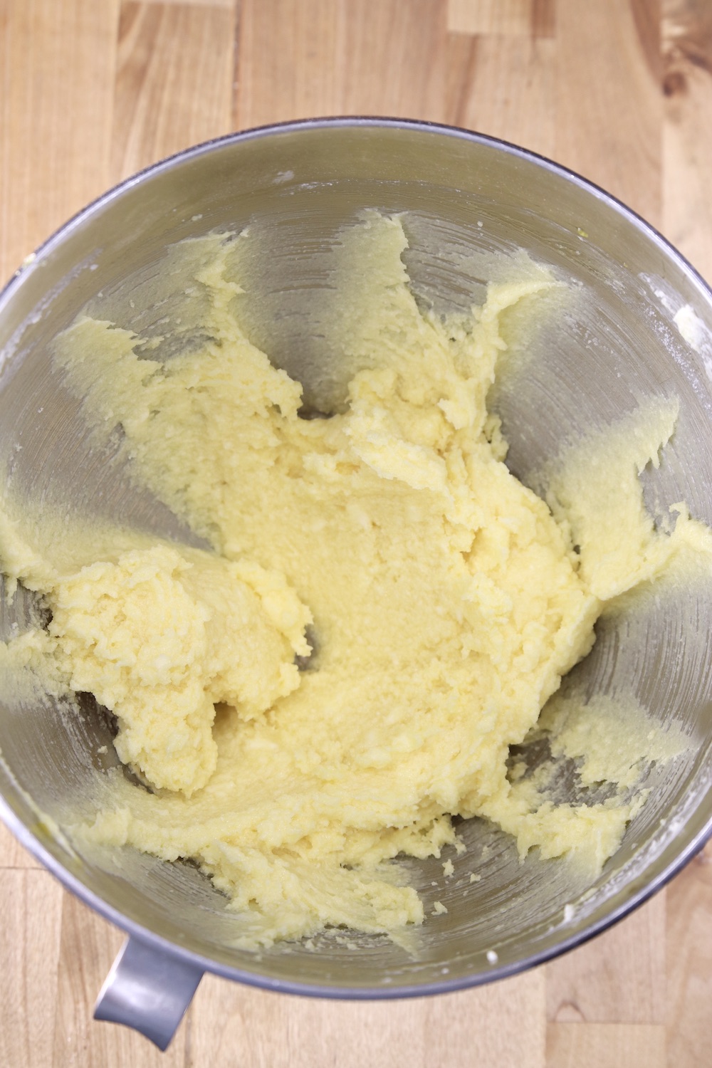 Mixer bowl of creamed butter, sugar and eggs