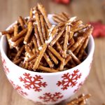 Snowflake bowl filled with candied pretzel sticks