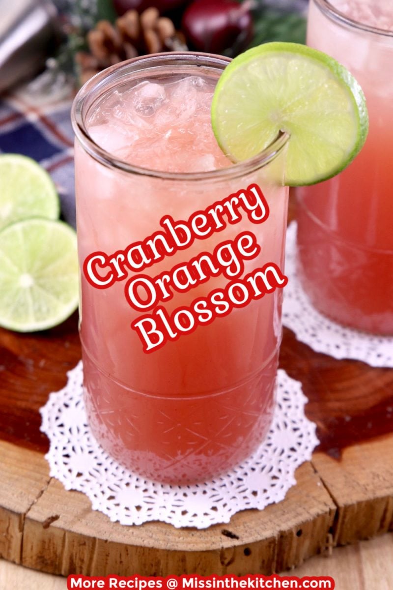 Cranberry Orange Blossom Cocktail in a glass - text overlay