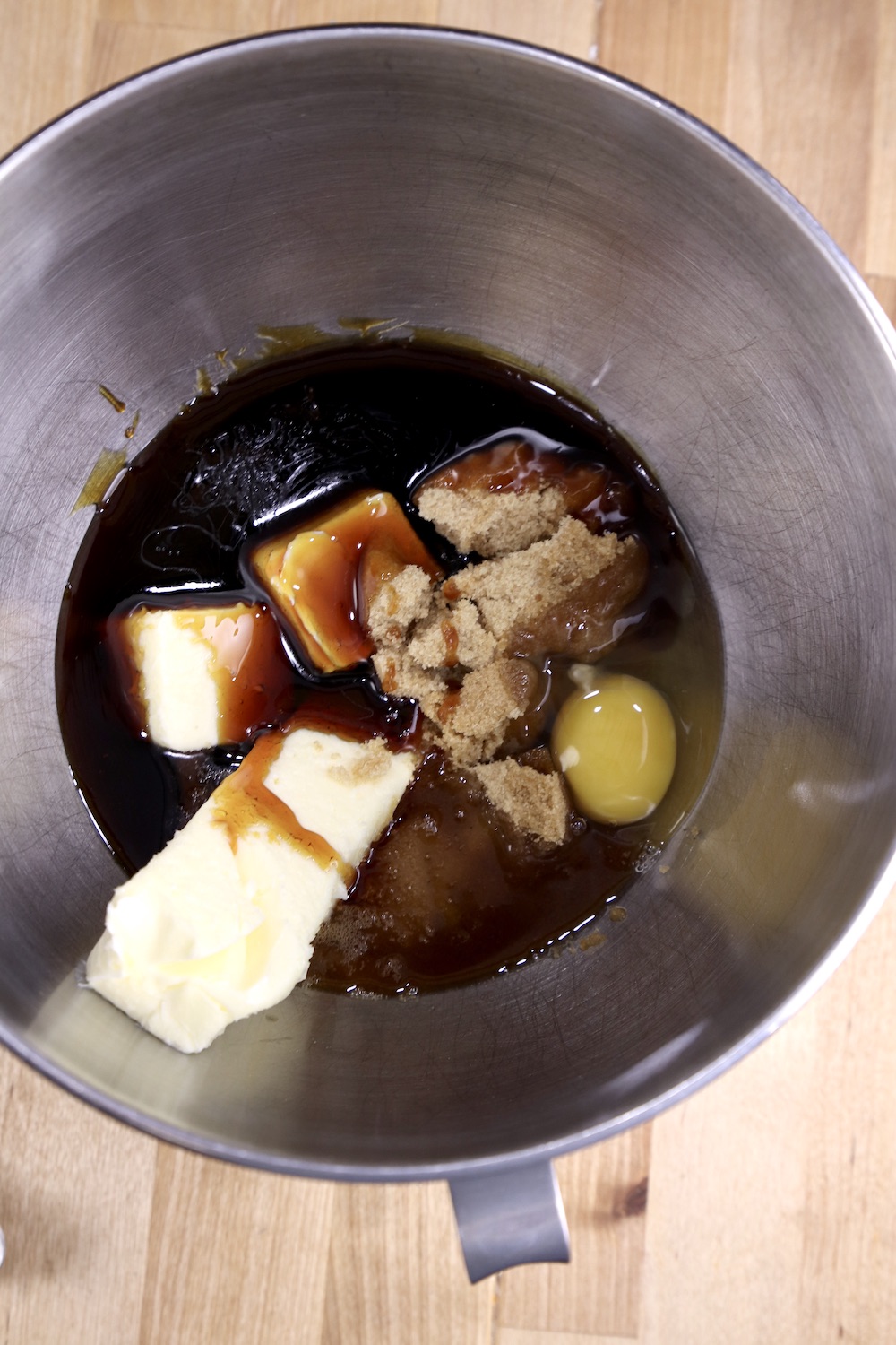 Bowl of molasses, butter, brown sugar and egg