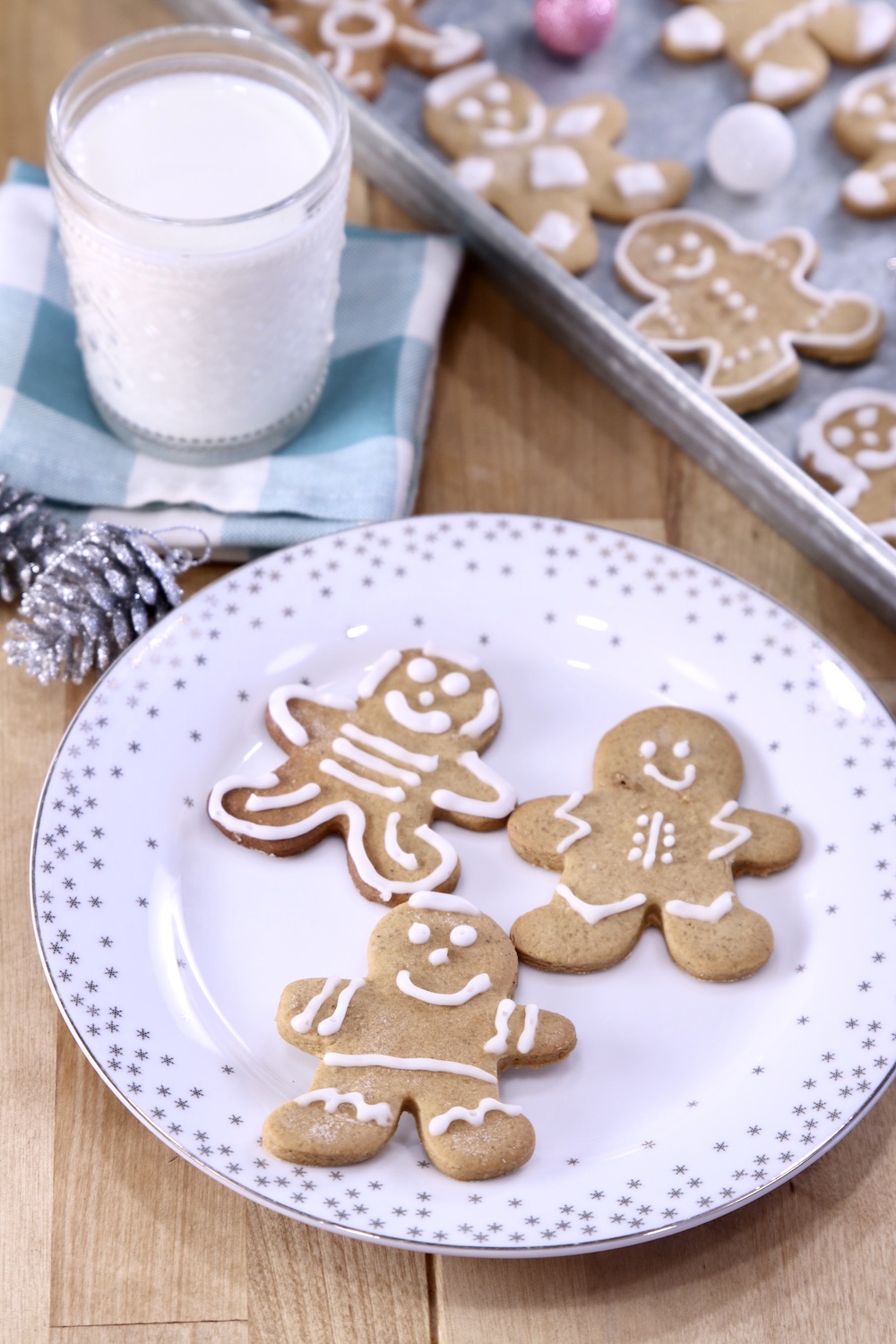 Gingerbread Cookies on a plate with a glass of milk