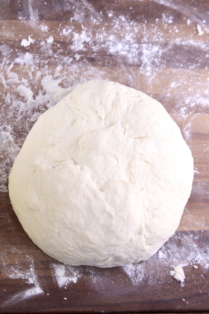 Ball dough on a floured board
