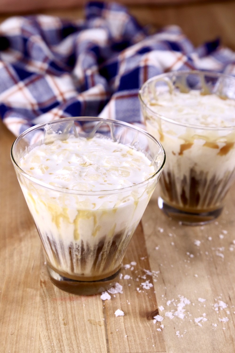 2 glasses with caramel drizzle and layered white Russian drinks