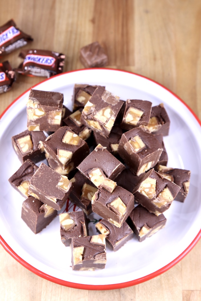 Plate of snickers fudge with mini snickers bars