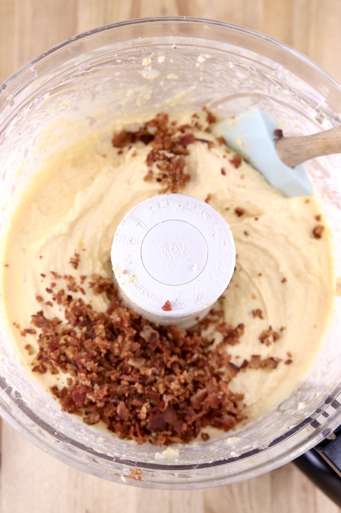 Beer Cheese Dip in a food processor with bacon