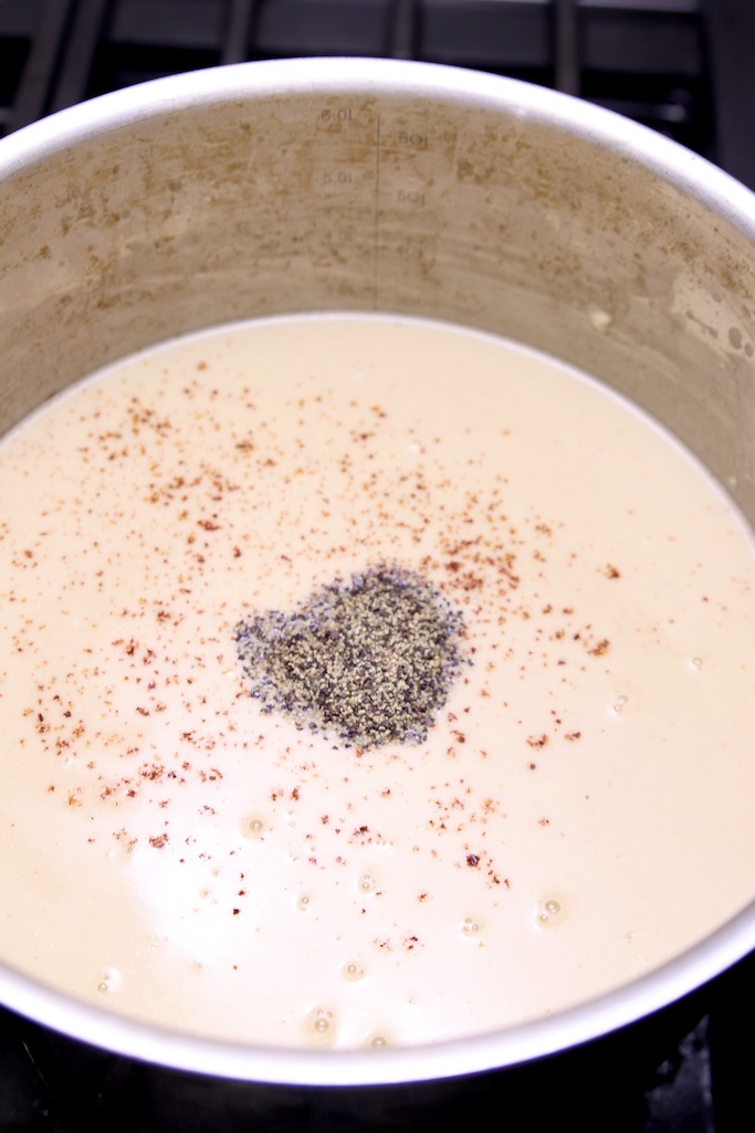 Beer Cheese Soup seasoned with salt pepper and red pepper