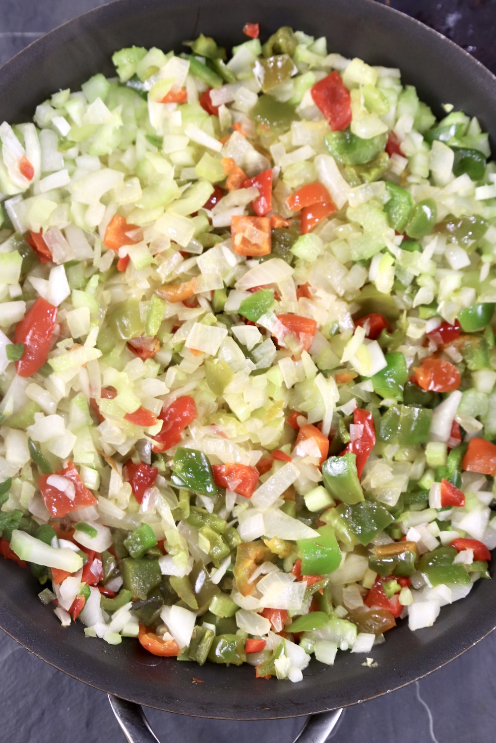 Cooked peppers, onions,celery in a skillet