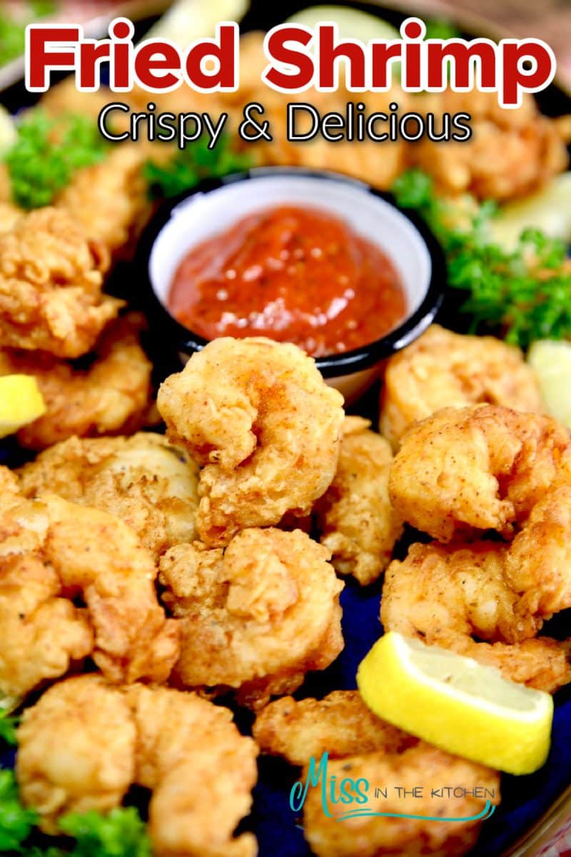 Fried Shrimp on a platter with cocktail sauce - text overlay.
