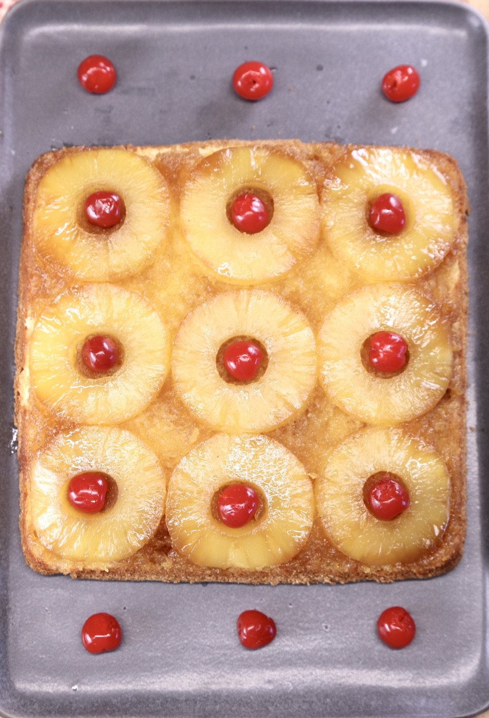 Pineapple Upside Down Cake with maraschino cherries