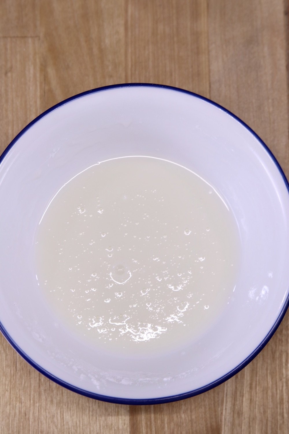 bowl of powdered sugar glaze