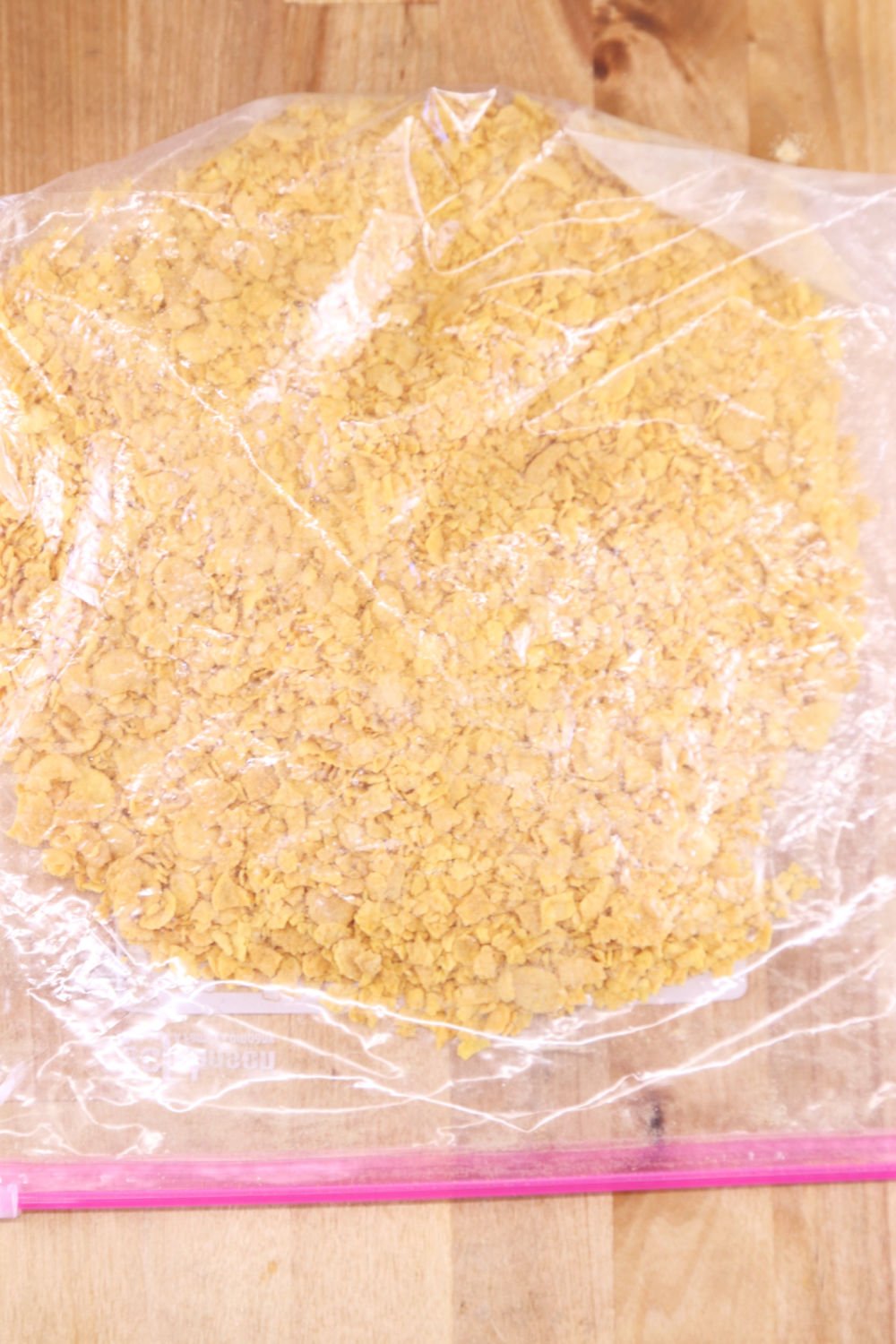 crushed cornflake crumbs in a baggy