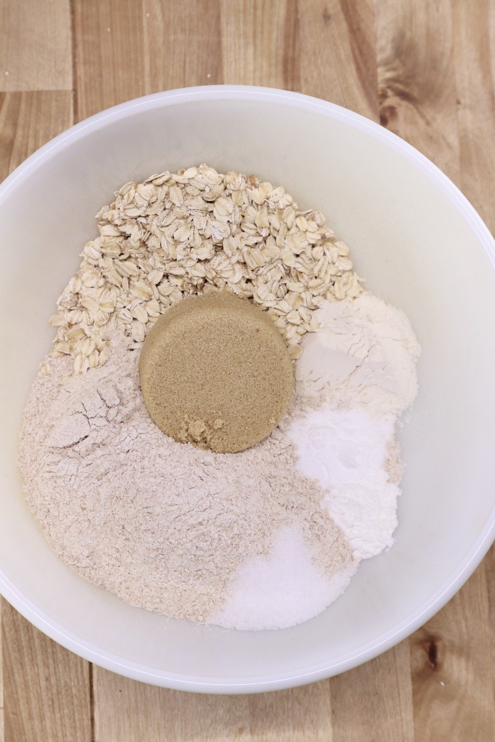 Bowl with flour, oats, brown sugar for Irish Brown Bread