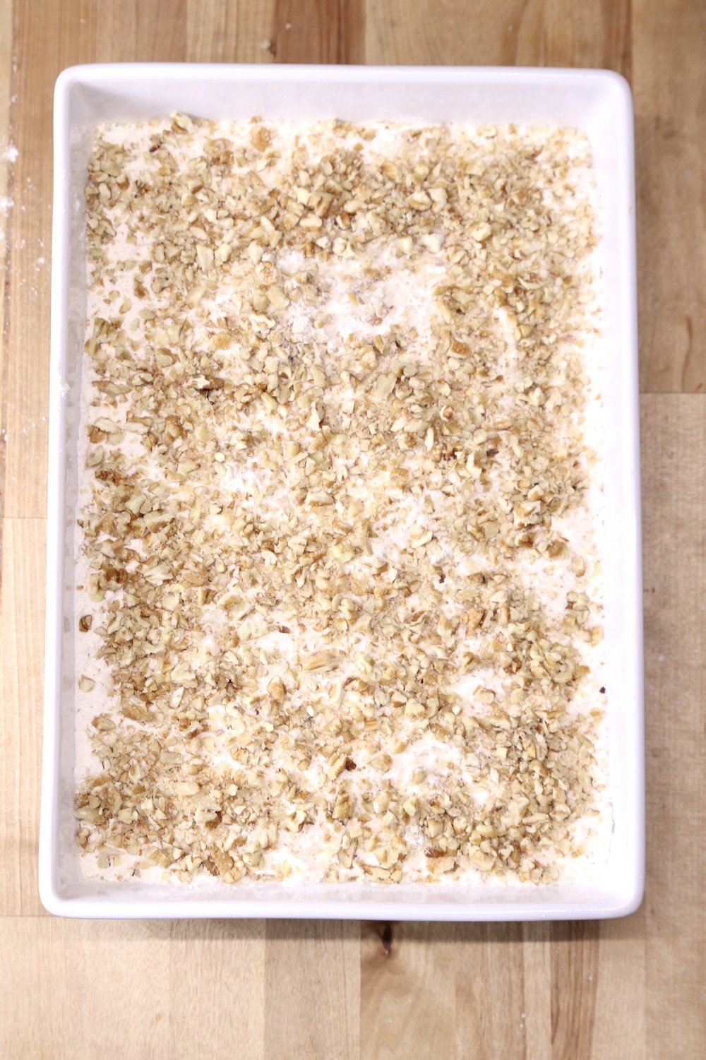 dry cake mix topped with chopped pecans