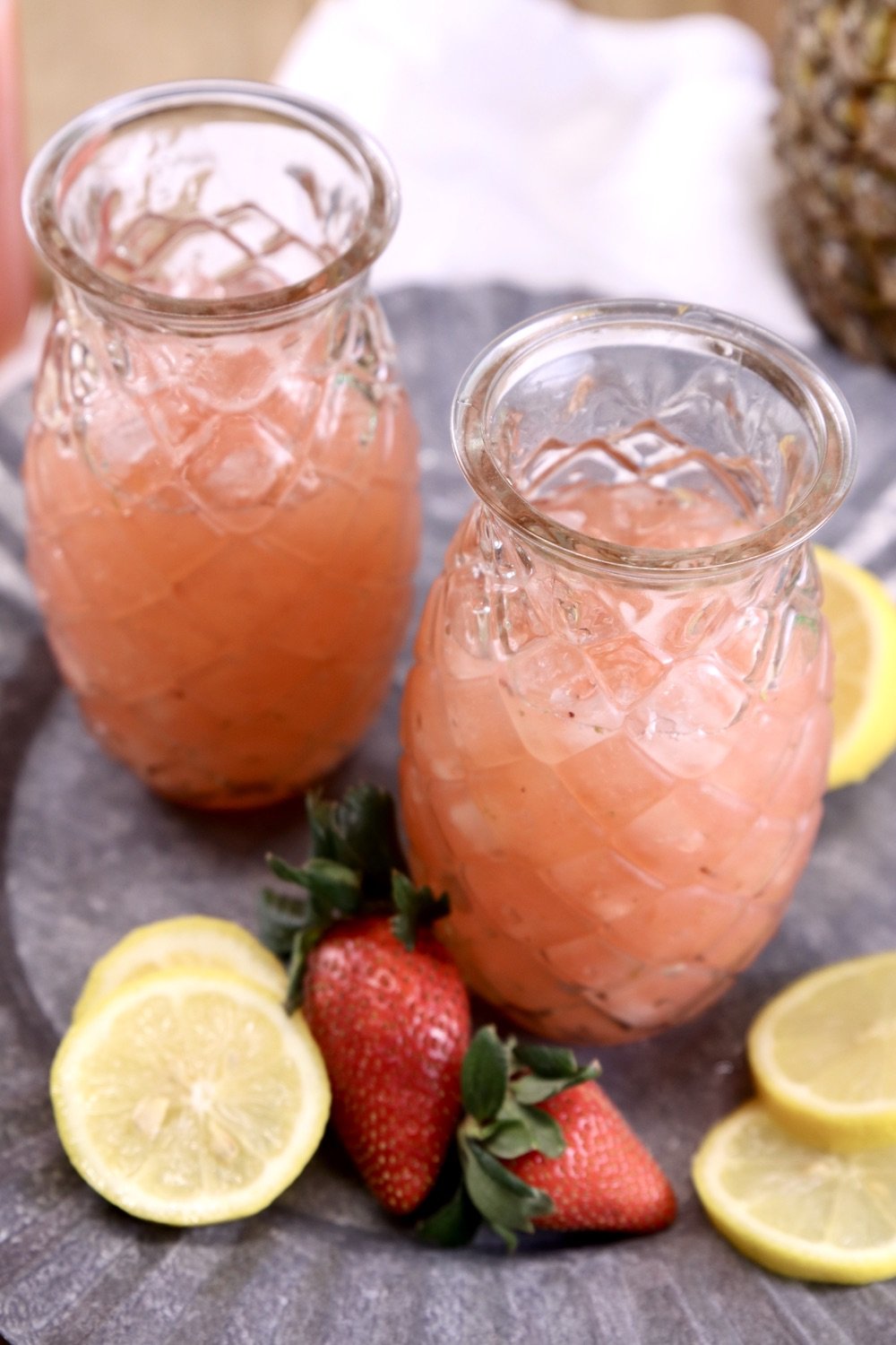 pineapple glasses with strawberry lemonade