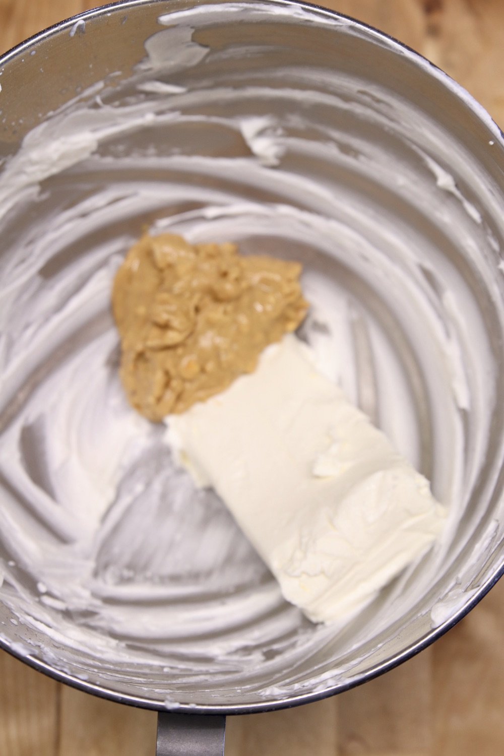cream cheese and peanut butter in a mixer bowl