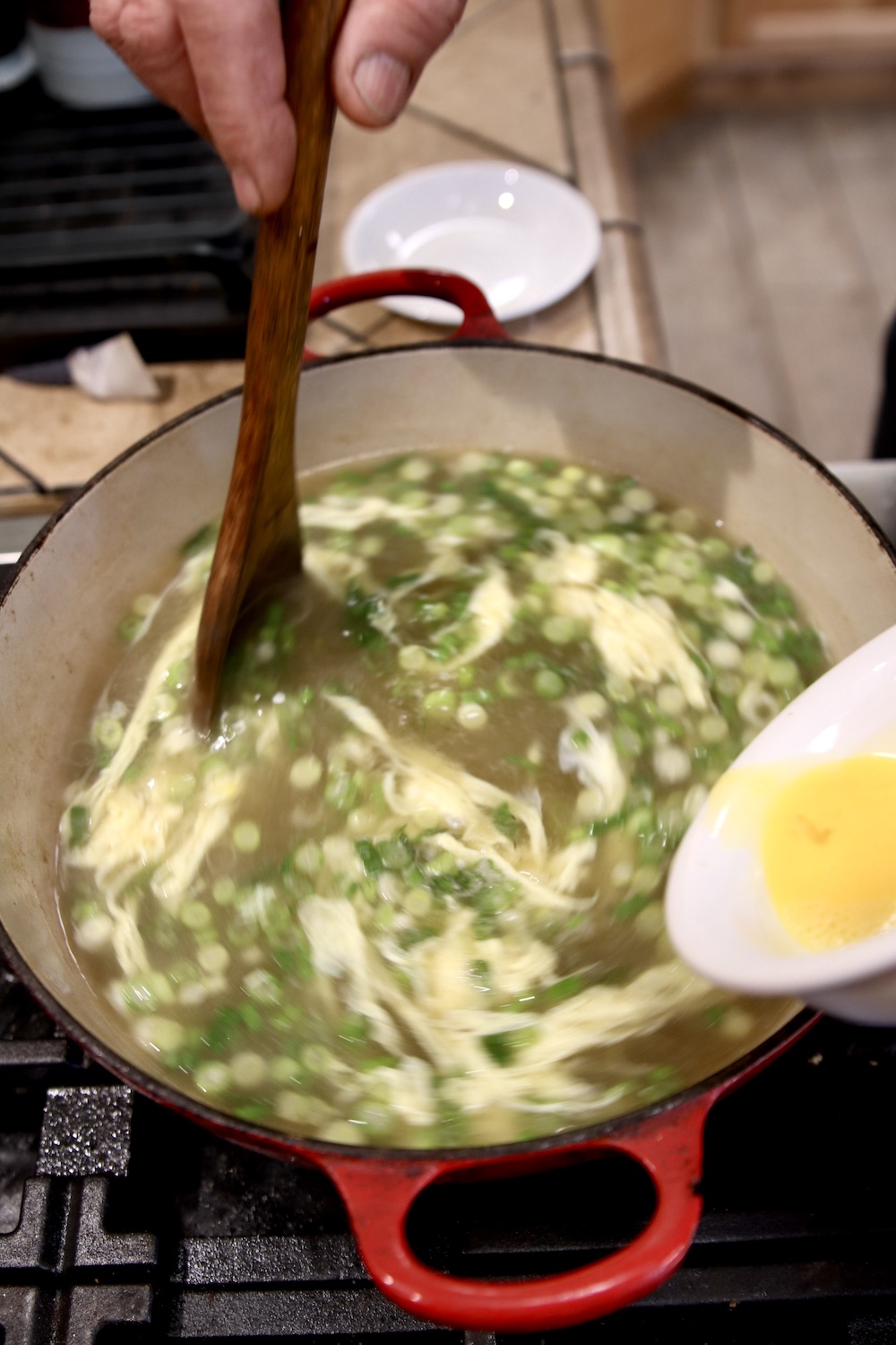 Making Stracciatella Soup with eggs