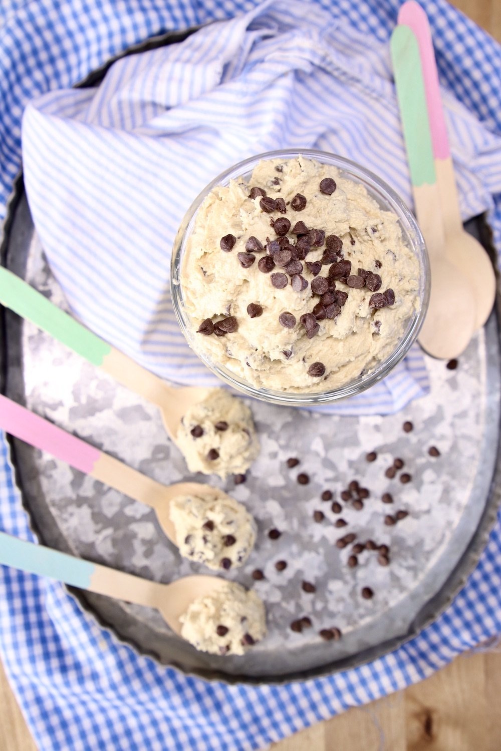jar and spoons of chocolate chip cookie dough
