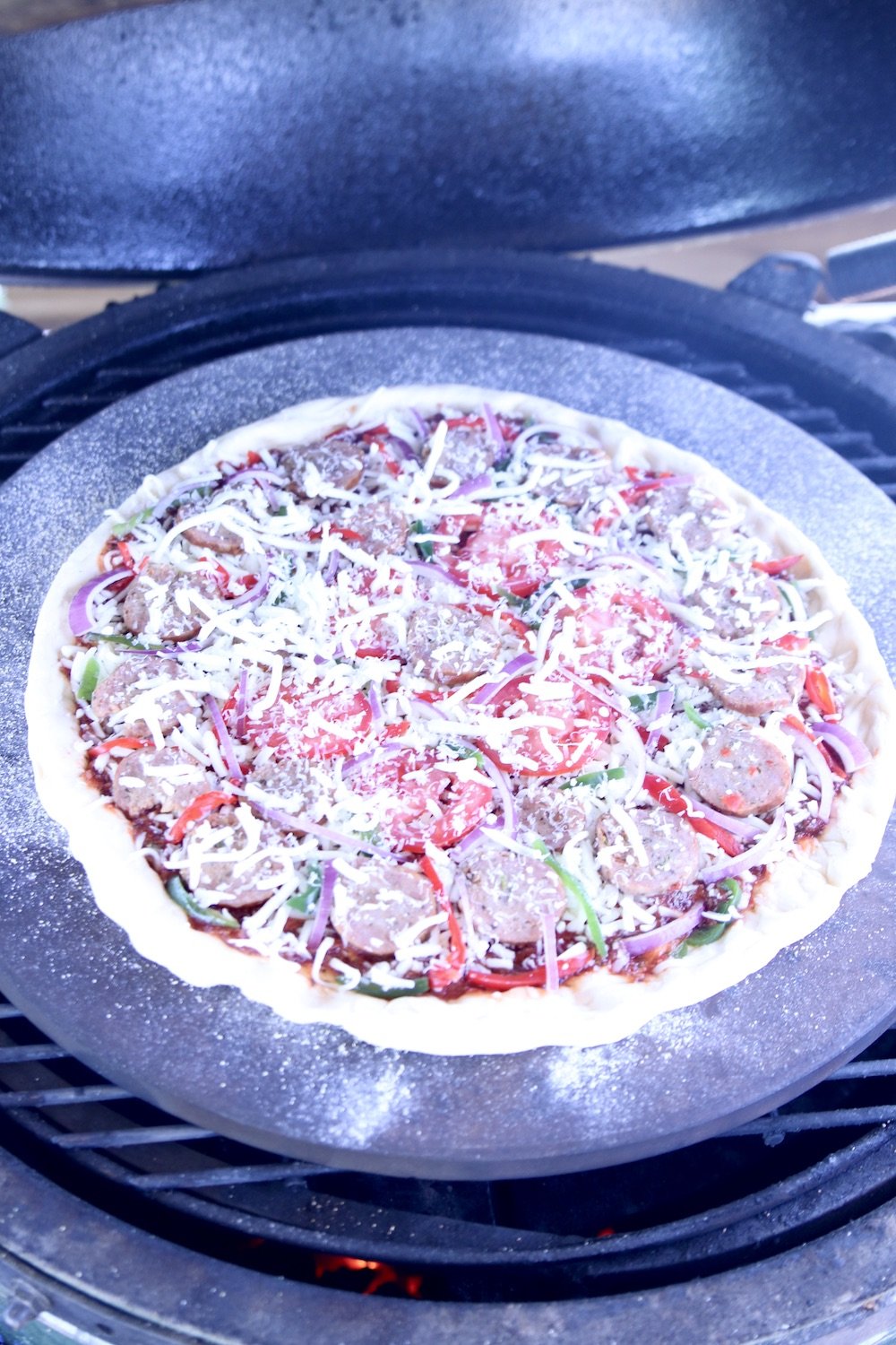 pizza on a pizza stone - grilling