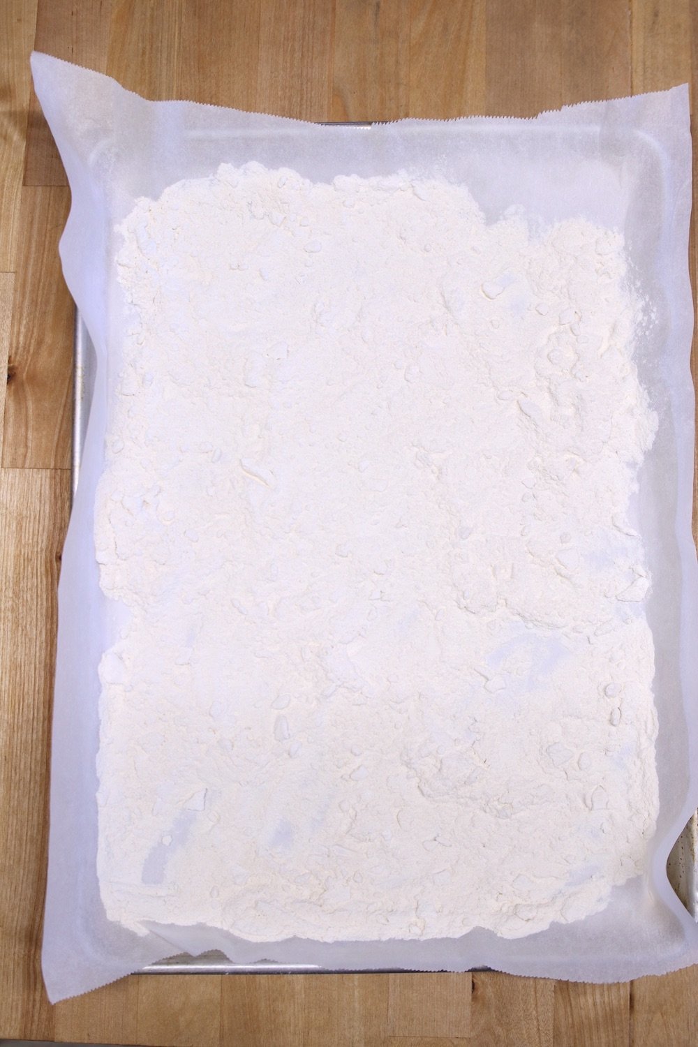 flour on a parchment lined baking sheet