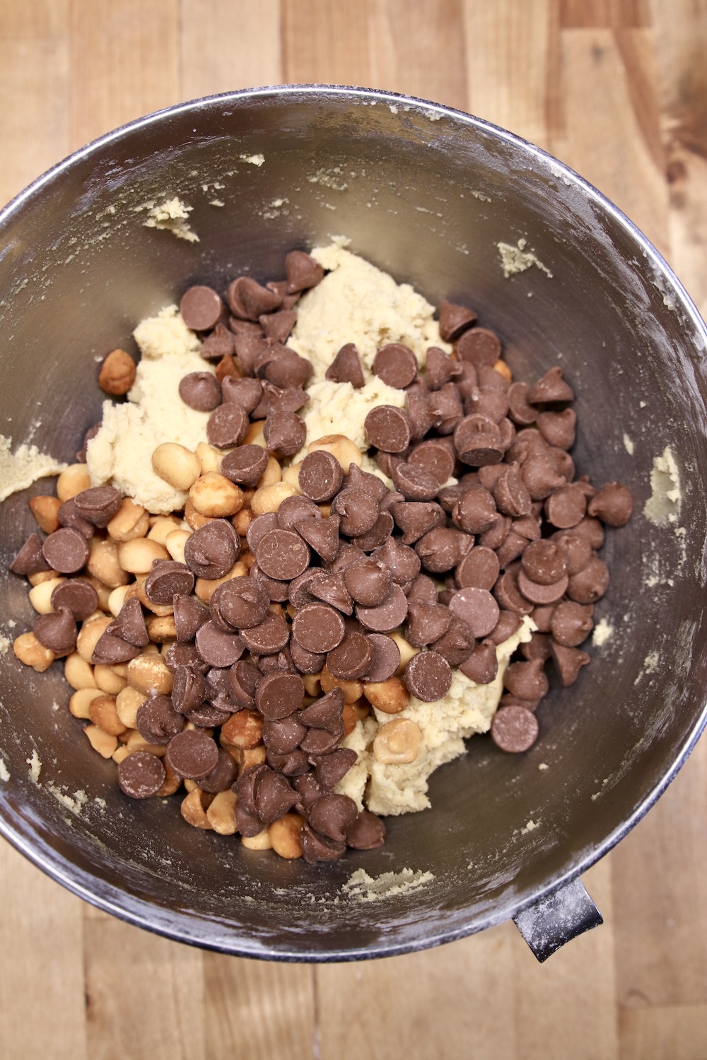 chocolate chips and macadamia nuts in cookie dough