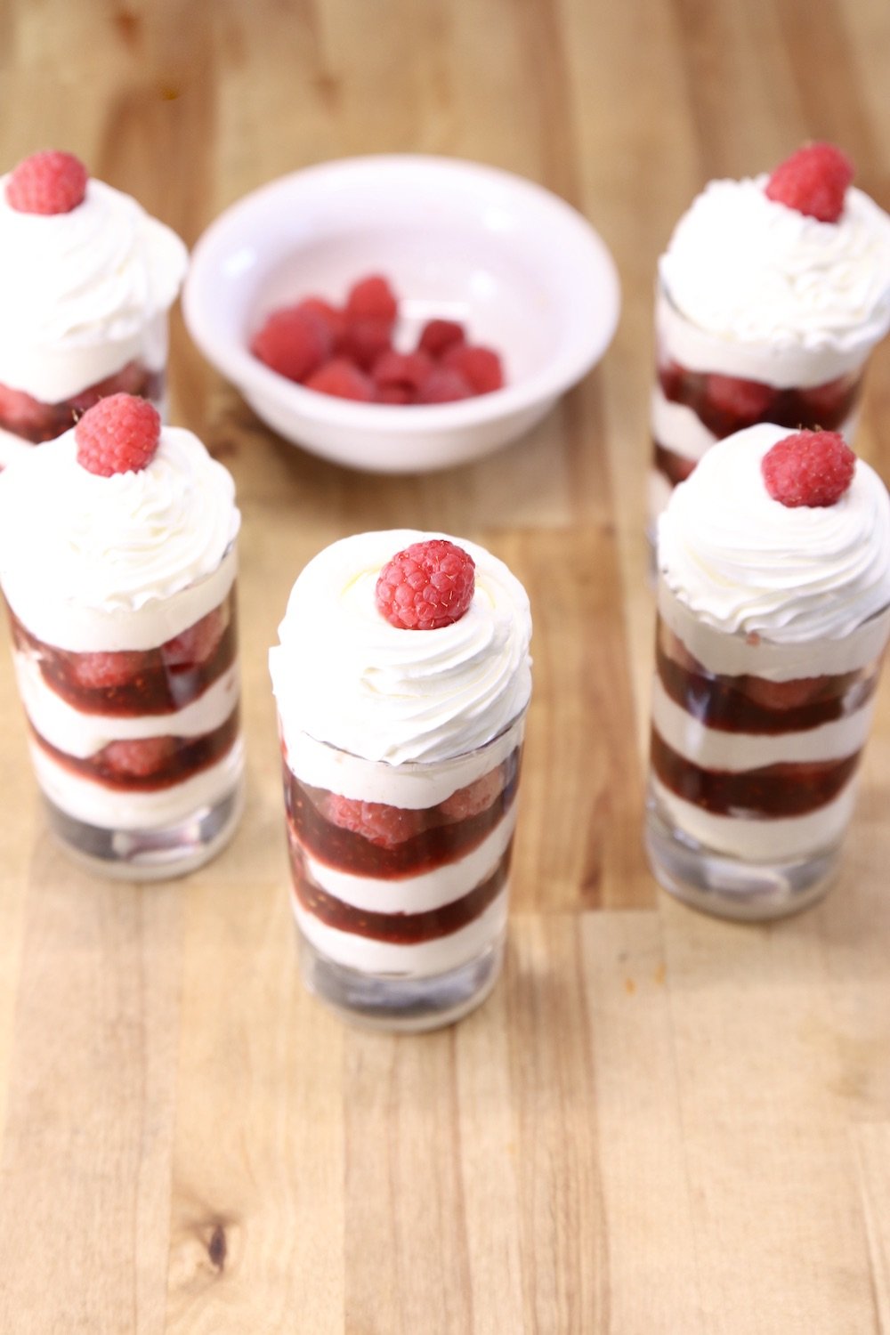 mini no bake cheesecake desserts with raspberries