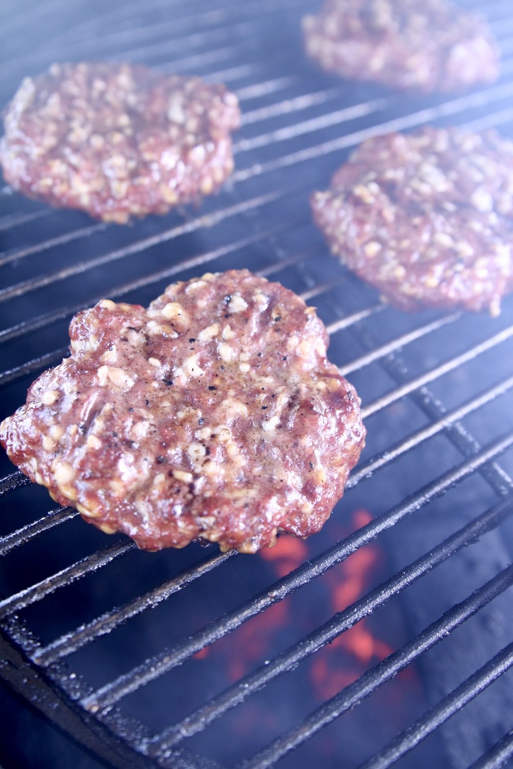 grilled burger patties on a grill