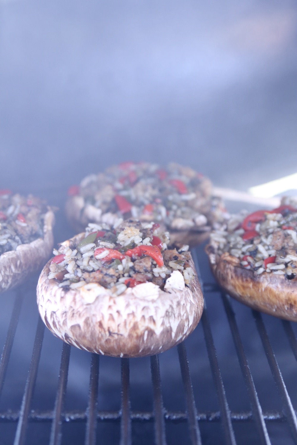 stuffed mushrooms on a grill 