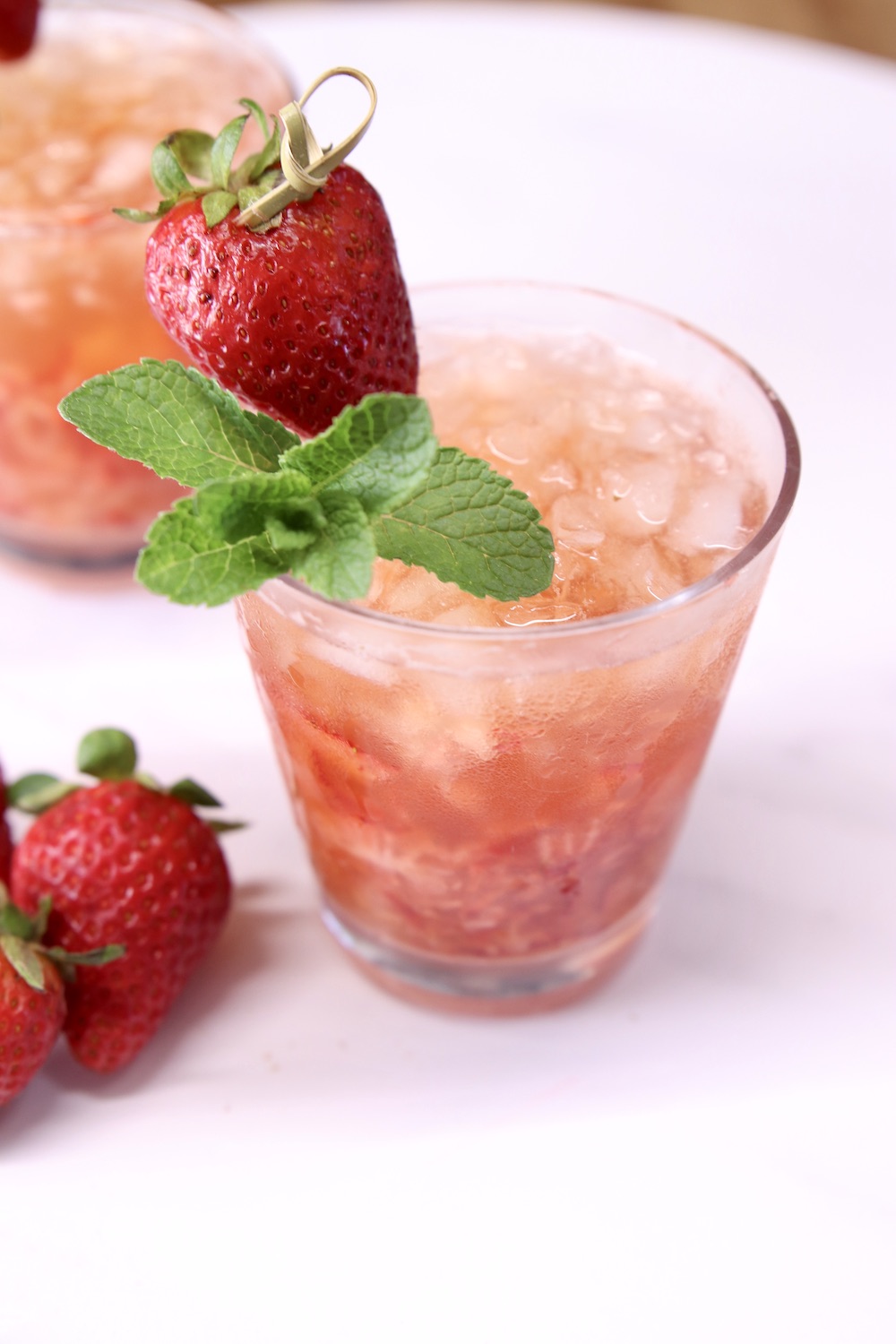 Strawberry cocktail with mint garnish