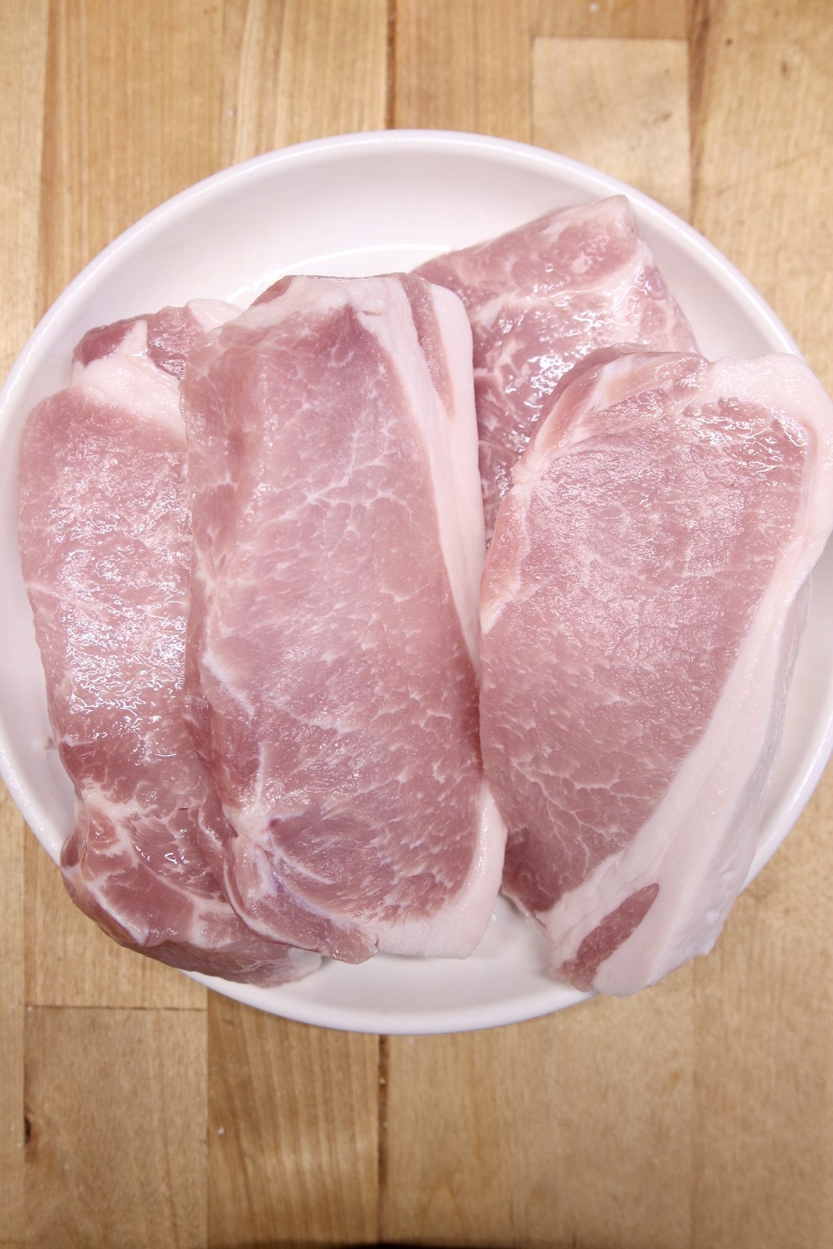 boneless pork chops on a plate