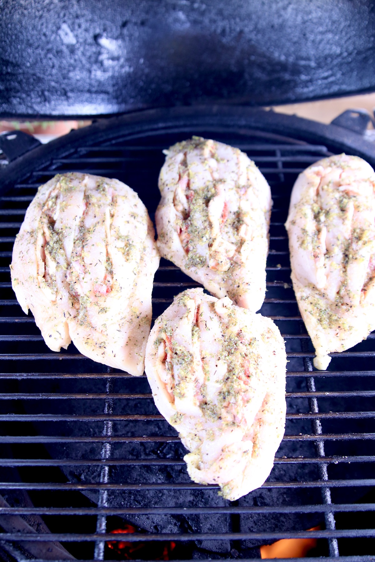 4 large chicken breasts on a grill